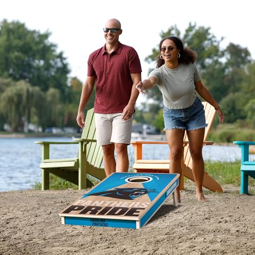 YouTheFan NFL 2' x 4' Slogan Series Professional Wood Cornhole Game with Logo Bags - color: Carolina Panthers