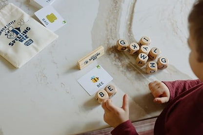 Chuckle & Roar Happy Little Spelling Bee Dice Game for Kids Ages 3-7+ – Educational Word & Letter Learning Game with 100 First Words, 10 Wooden Letter Dice, 5 Grow-With-Me Spelling Games & Storage Bag