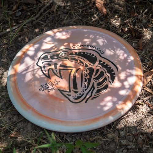 Lone Star Disc Alpha Copperhead | Slightly Overstable Disc Golf Approach Disc | Durable & Smooth Premium Plastic | Great Driving Putter | Colors May Vary - color: 170g+ (Stock Stamp)