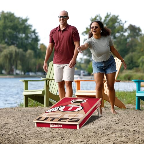 YouTheFan NCAA 2' x 4' Slogan Series Professional Wood Cornhole Game with Logo Bags - color: Utah Utes