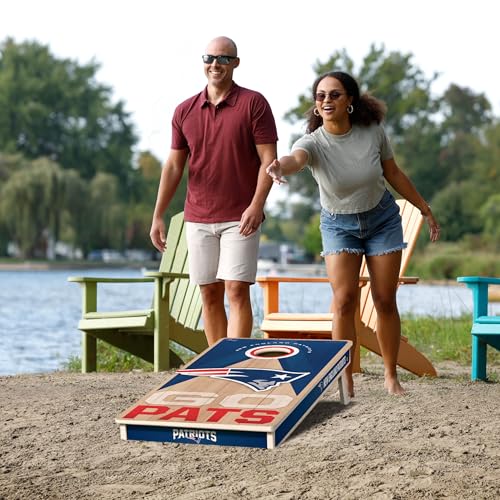 YouTheFan NFL 2' x 4' Slogan Series Professional Wood Cornhole Game with Logo Bags - color: New England Patriots