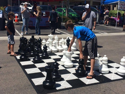 MegaChess 25 Inch Plastic Giant Chess Set with Commercial Grade Roll-Up Chessboard